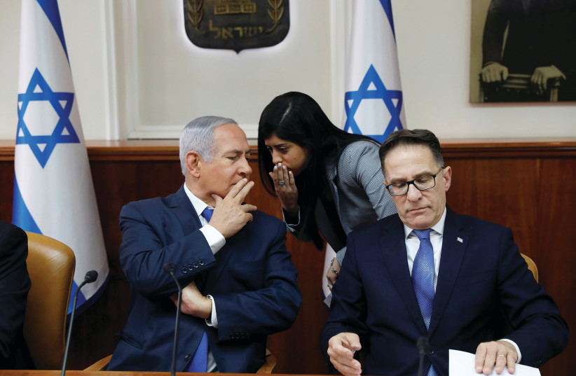 'The immediate aim of Netanyahu’s move was to reduce the chances of the Right losing as many as five seats due to the multiplicity of right-wing religious parties.’  (photo credit: REUTERS)