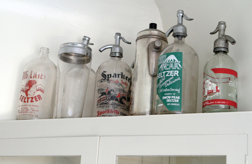 SELTZER SIPHONS, a relic of a bygone era, sit on a shelf in Los Angeles, California, in 2011. (Mel Melcon/Los Angeles Times/MCT) (photo credit: MEL MELCON/LOS ANGELES TIMES/MCT)