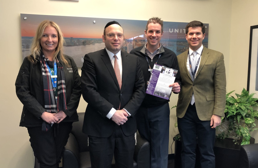Duvi Honig, Founder and CEO of the Orthodox Jewish Chamber of Commerce meets with high-ranking officials from United Airlines. (photo credit: Courtesy)