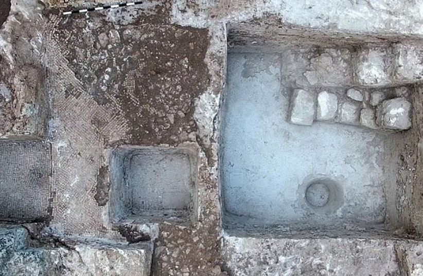 The ancient wine press and inscription uncovered at Tzur Natan. (photo credit: Israel Antiquities Authority)