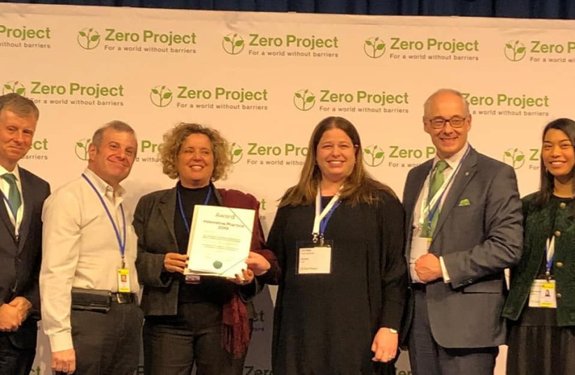 Zero Project foundation award given to Mimi Palachi [Center L] state supervisor for special education at the Ministry of Education and Yifat Klein [Center R] head of special need youth education program at Joint Ashalim (photo credit: Courtesy)