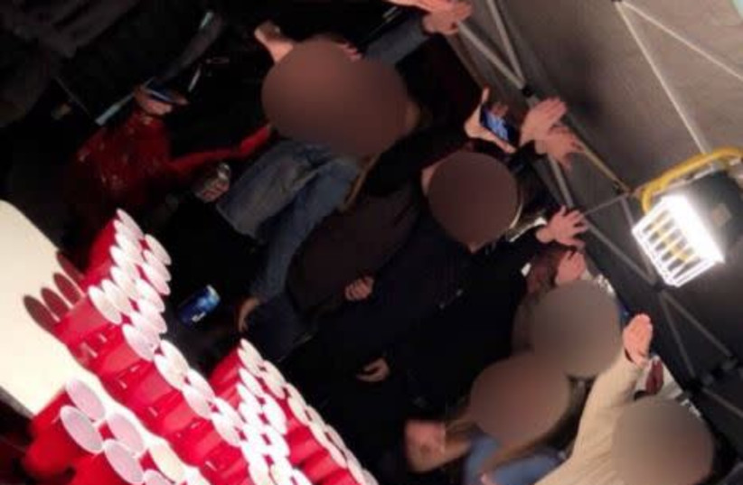 Teens from a California high school give the Nazi salute during a drinking game. (photo credit: TWITTER SCREENSHOT)