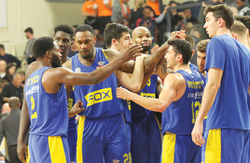MACCABI TEL AVIV was given all it could handle by Maccabi Rishon Lezion on Monday night in BSL action, but the yellow-and-blue managed to pull off a thrilling 94-92 victory to remain in first place (photo credit: ADI AVISHAI)