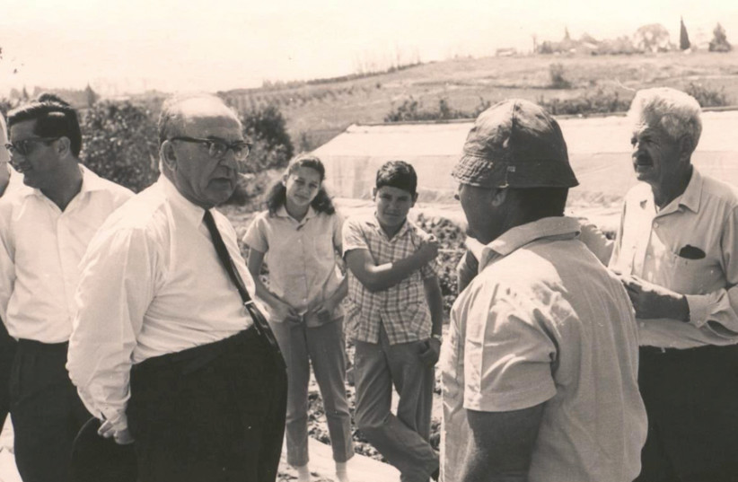 ESHKOL, IN his role as agriculture minister, visits the Sde Warburg cooperative village. (photo credit: Wikimedia Commons)