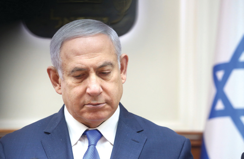 PRIME MINISTER Benjamin Netanyahu – if they go to trial, how will his corruption trials end? (photo credit: MARC ISRAEL SELLEM)