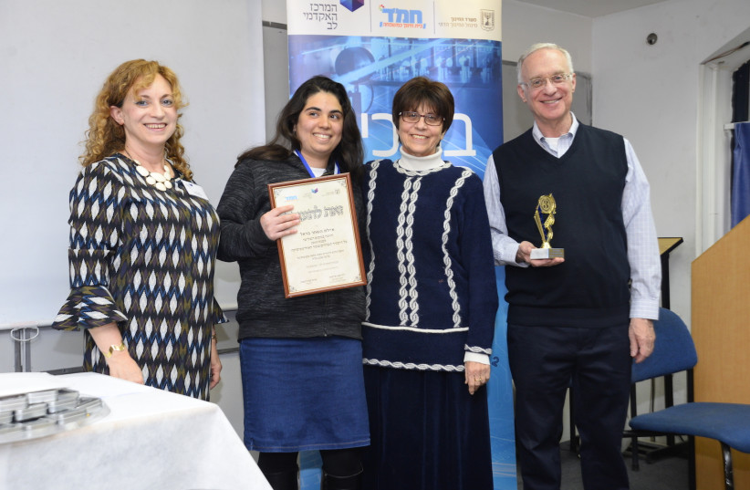 Head of JCT’s Tal Campus for women, Eti Stern, Third place Ayelet-Hashachar Bar'el and her teacher Yocheved Barstel, rector of the Jerusalem College of Technology (JCT) prof. Kenneth Hochberg. (photo credit: Courtesy)