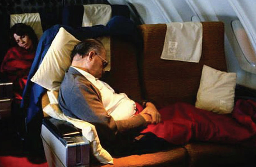 The famous photograph of Menachem Begin sleeping on a 12-hour flight to the US posted by the legendary photographer, the late David Rubinger, on Facebook, and exhibited recently at the Eretz Israel Museum in Tel Aviv (photo credit: DAVID RUBINGER / YEDIOT AHRONOTH)