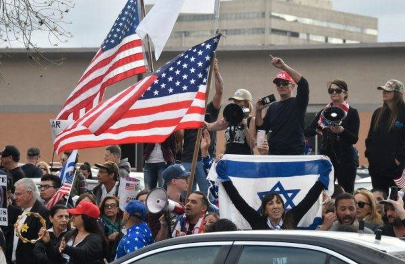 Stop Antisemitism staged a large protest outside the Hilton Hotel in Los Angeles where Ilhan Omar was speaking on March 23, 2019 (photo credit: GENE BLEVINS)