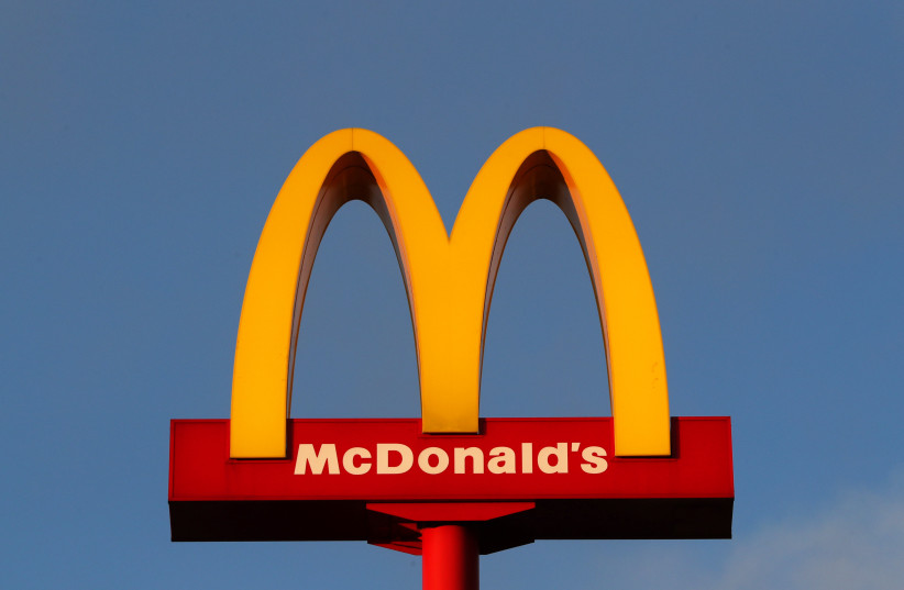 A sign for the U.S. fast food restaurant chain McDonald's is seen outside one of their restaurants (photo credit: YVES HERMAN / REUTERS)