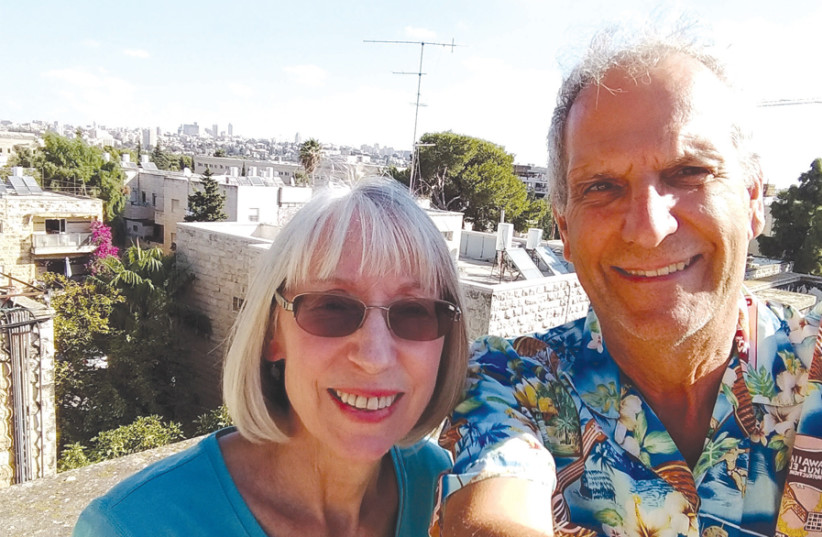 SMILING ON the roof of their rental flat, Jerusalem. (photo credit: Courtesy)
