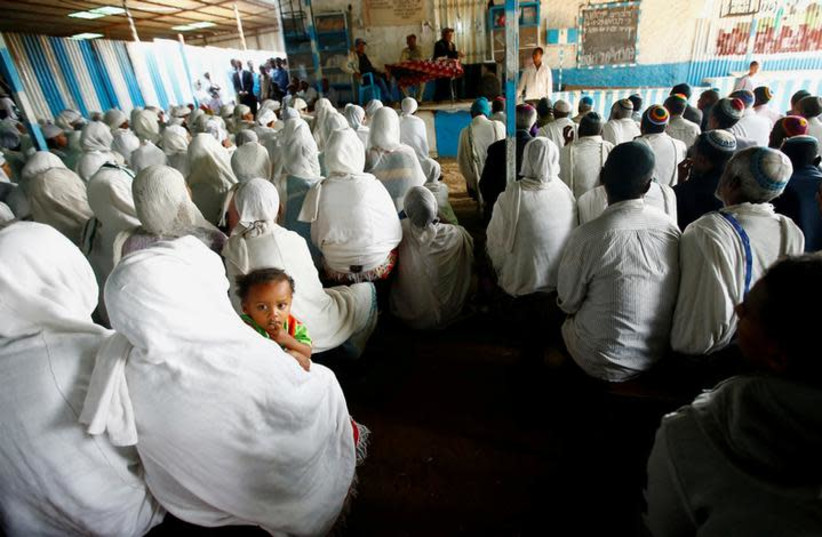 Members of the Falash Mura Jewish Ethiopian community attend a prayer service at the HaTikvah Synagogue in Gondar, northern Ethiopia, September 30, 2016 (photo credit: REUTERS/TIKSA NEGERI)