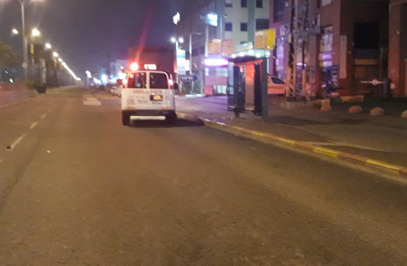 MDA ambulance arrives at the scene where a man was hit by a car in Haifa (photo credit: MDA)