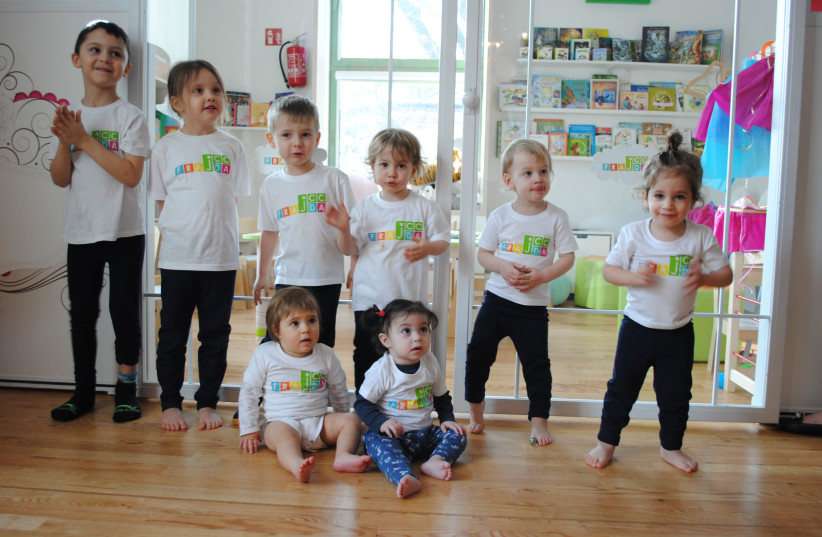 TODDLERS IN their Krakow JCC T-shirts, in the city’s first Jewish preschool since the Holocaust, which opened two years ago (credit: Courtesy)