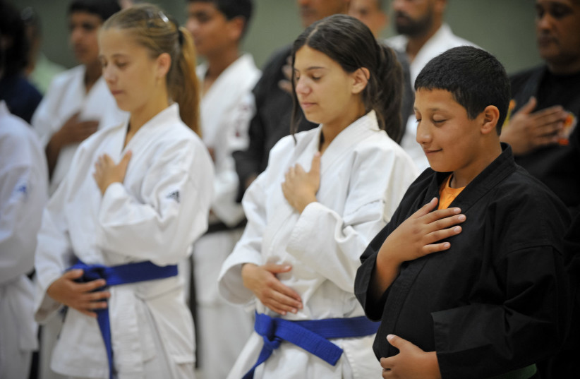 Israeli children practice martial arts as a way to promote peace  (photo credit: BUDO FOR PEACE)