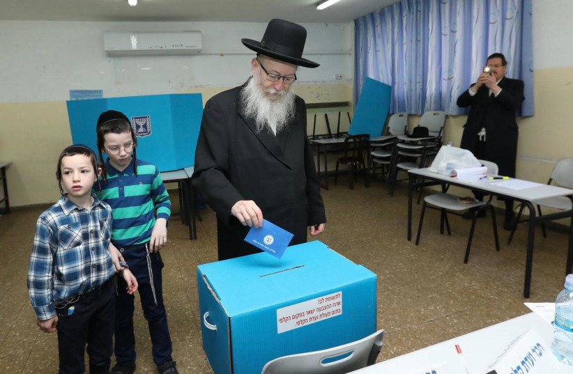 Yaakov Litzman voting (photo credit: SHLOMI COHEN)