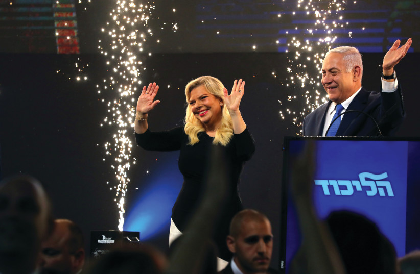 BENJAMIN AND Sara Netanyahu celebrate in Tel Aviv on election night (photo credit: REUTERS)