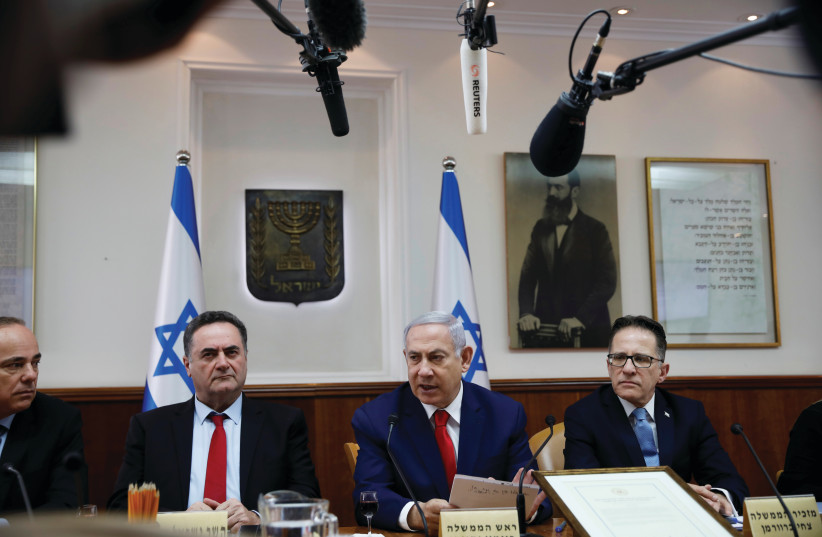 STILL IN power. Prime Minister Benjamin Netanyahu at a recent cabinet meeting (photo credit: REUTERS)