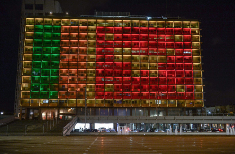 Tel Aviv lit up in a display of the Sri Lanka flag (photo credit: KOBI RICHTER/TPS)