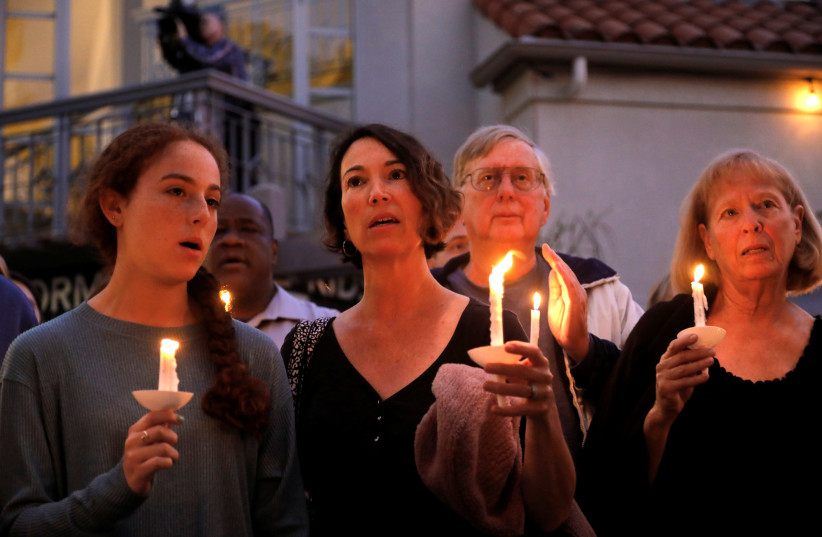 A candlelight vigil is held at Rancho Bernardo Community Presbyterian Church for victims of a shooting incident at the Congregation Chabad synagogue in Poway, north of San Diego, California, U.S. April 27, 2019 (photo credit: REUTERS/JOHN GASTALDO)