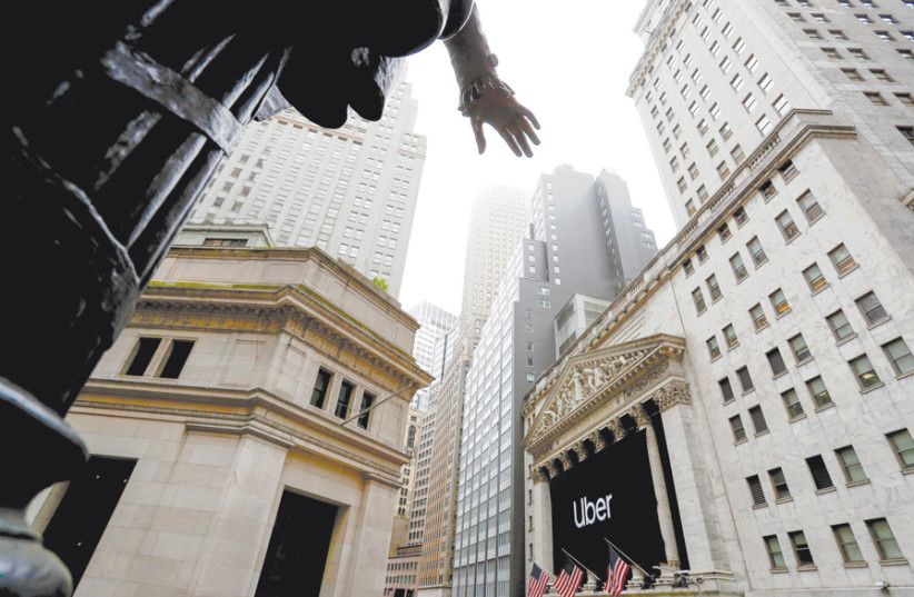‘THE BIGGEST risk for a company heading to Wall Street (pictured) with an IPO is that it will enter the market when it is underfunded.’ (photo credit: ANDREW KELLY / REUTERS)