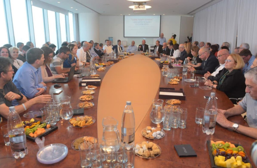 Israeli bar association during a meeting in which they vow to defend the High Court   (photo credit: AVSHALOM SASSONI)