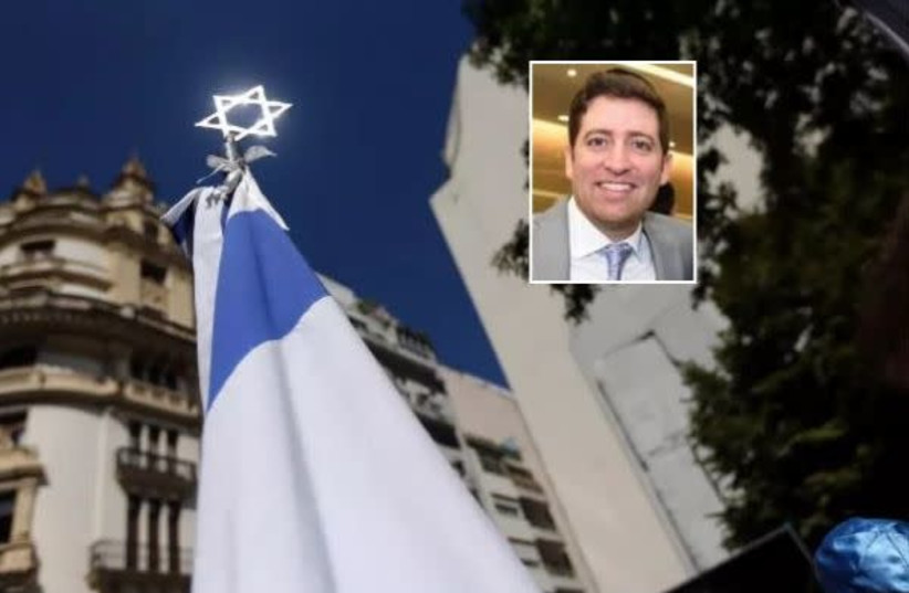 A Star of David is seen outside the former Israeli embassy in Buenos Aires, Argentina. Inset: Rabbi Elyahu Shaman (photo credit: MARCOS BRINDICCI/REUTERS)
