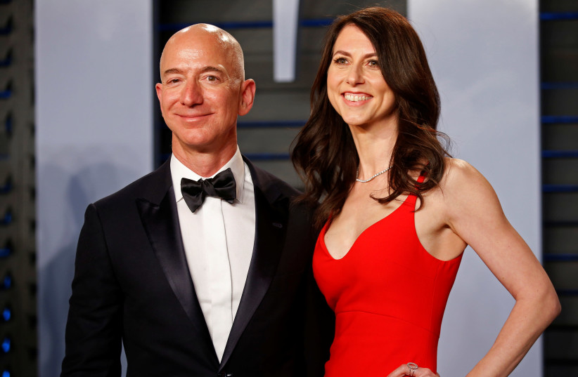  Amazon CEO Jeff Bezos with his then-wife MacKenzie Bezos 04/03/2018 (photo credit: DANNY MOLOSHOK/ REUTERS)