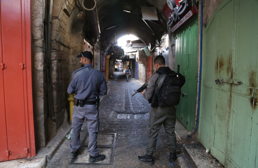Israel Border Police guard an area in the Arab market in Jerusalem's Old City following a terrorist attack (photo credit: ISRAEL POLICE)