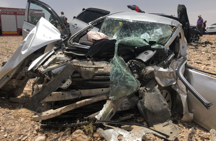 Remnants of a car involved in a car accident in the Arava where two children died (photo credit: FIRE AND RESCUE SERVICE SOUTHERN DISTRICT)