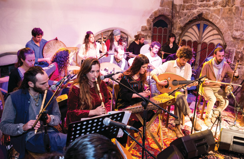 THE MAQAMAT MUSIC Center’s founder Moshe Tov-Kreps and some of his students (photo credit: NOAM DAHAN)
