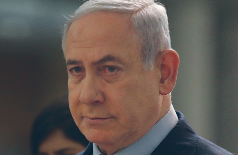 NETANYAHU AFTER the late-night vote. (photo credit: MARC ISRAEL SELLEM)