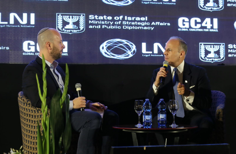 U.S. Special Envoy for Monitoring and Combating Antisemitism, Elan Carr is interviewed by the Jerusalem Post Editor in Chief Yaakov Katz at the GC4I conference in Jerusalem (photo credit: MIRI SHIMONOVICH/GPO)