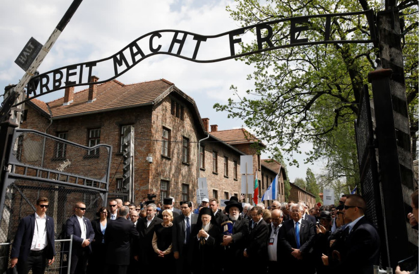 Youth attend the annual March of the Living at the former Nazi concentration camp of Auschwitz on May 2, 2019 (photo credit: KASPER PEMPEL/REUTERS)