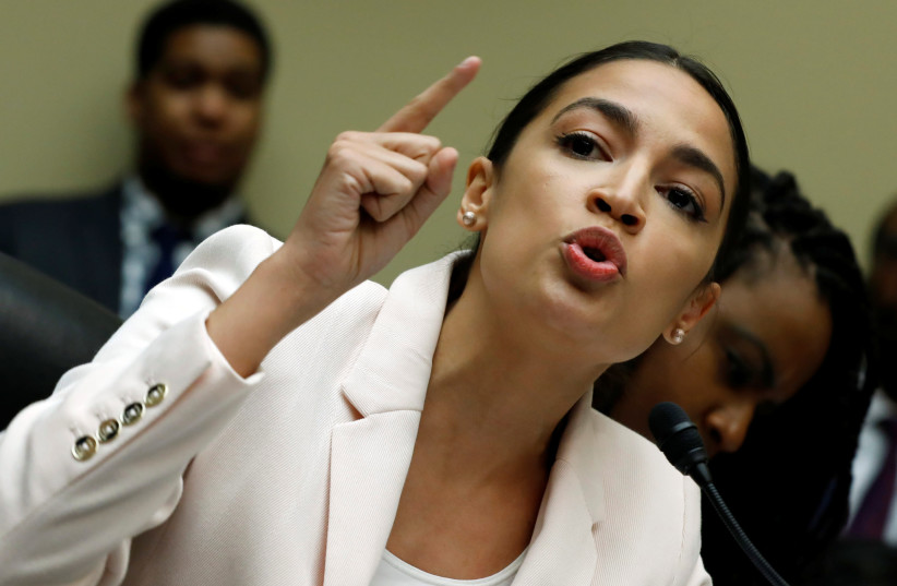 Rep. Alexandria Ocasio-Cortez (D-NY) speaks during House Oversight and Reform Committee hearing (photo credit: YURI GRIPAS / REUTERS)