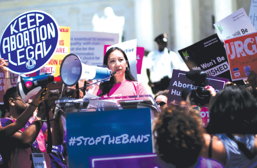 FORMER PLANNED PARENTHOOD president Dr. Leana Wen speaks at a protest against anti-abortion legislation at the US Supreme Court in Washington on June 20. (photo credit: REUTERS/JAMES LAWLER DUGGAN)