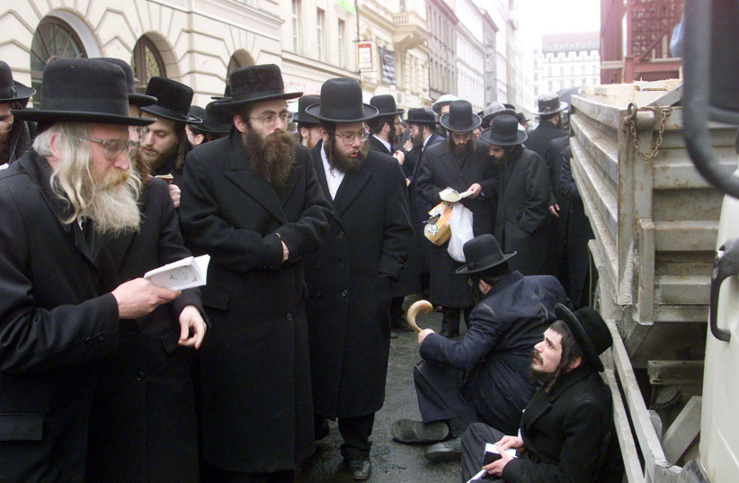 Ultra-Orthodox Jews in the Czech Republic praying (photo credit: PETR DAVID JOSEK/REUTERS)