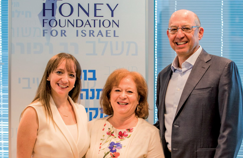 The Lipsey Family (from left to right): Sarah Lipsey Brokman, Amy Lipsey, Bill Lipsey; Amy and Bill Lipsey are the co-founders of the Honey Foundation for Israel, Sarah is its president (photo credit: HERSCHEL GUTMAN)