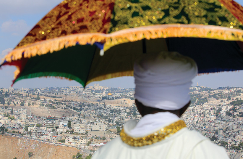 AN ETHIOPIAN-ISRAELI spiritual leader participates in the main Sigd holiday prayer gathering at the Armon Hanatziv Promenade in Jerusalem last November. (photo credit: MARC ISRAEL SELLEM/THE JERUSALEM POST)