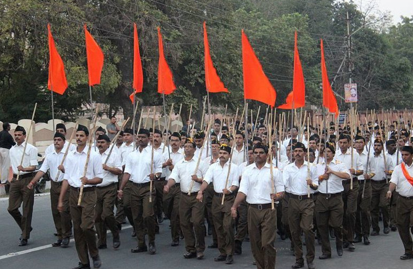 RSS members march  (photo credit: SUYASH DWIVEDI/WIKIMEDIA COMMONS)