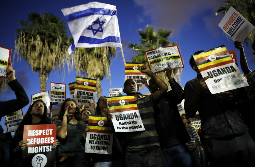 Protesters demonstrate against the Israeli government's plan to deport African migrants, in Tel Aviv (photo credit: REUTERS/CORINNA KERN)