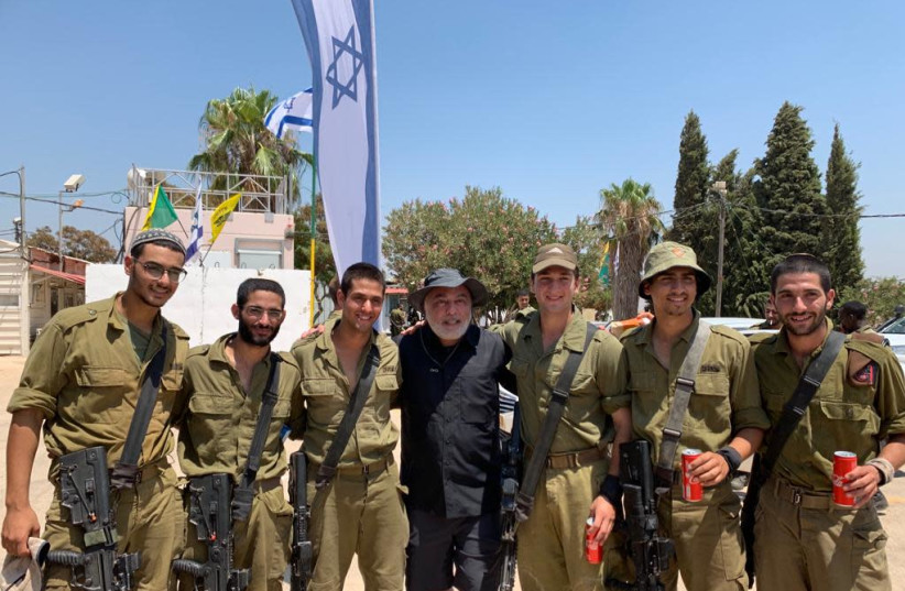 Atour Eyvazian spends time with IDF soldiers during his first-ever trip to Israel this week (photo credit: THE INTERNATIONAL FELLOWSHIP OF CHRISTIANS AND JEW)
