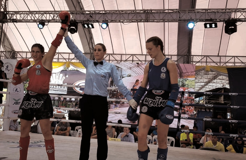 ISRAELI FIGHTER Nili Block (left) captured her fourth straight gold medal at the IFMA World Muaythai Championships over the weekend in Bangkok. (credit: AYELET/COURTESY)