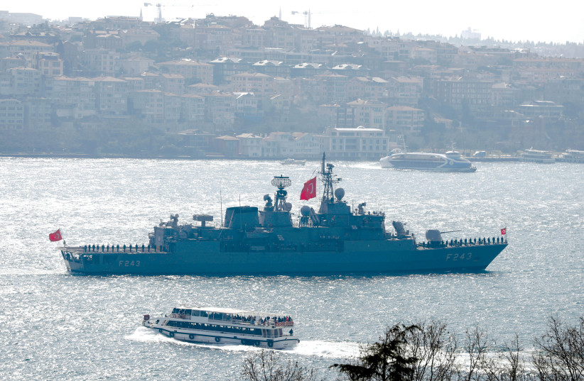 A TURKISH NAVY frigate, returning from a naval exercise, sails in the Bosphorus in Istanbul, earlier this year (photo credit: REUTERS/MURAD SEZER)
