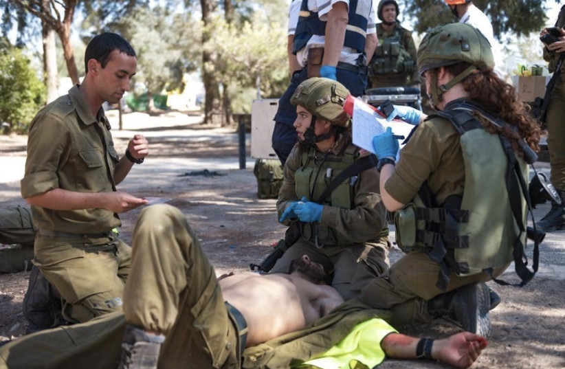 IDF medical officers take part in a drill (Illustrative) (photo credit: IDF SPOKESPERSON'S UNIT)
