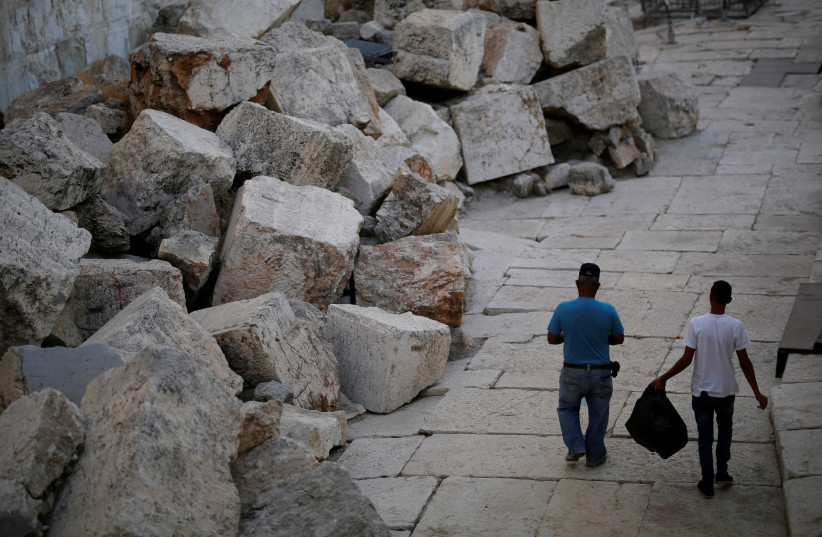The ruins of the Second Temple that sit next to a part of the Western Wall (photo credit: REUTERS/AMIR COHEN)