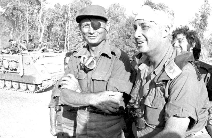 MOSHE DAYAN and Ariel Sharon in 1973. The trickle became a deluge after the Six Day War (photo credit: REUTERS)