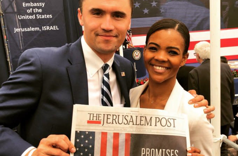 Candace Owens (R) and Charlie Kirk (L) holding a copy of The Jerusalem Post (credit: CHARLIE KIRK)