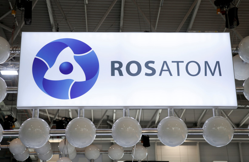 The logo of Rosatom Corp. is pictured at the World Nuclear Exhibition (WNE), the trade fair event for the global nuclear community in Villepinte near Paris, France, June 26, 2018. (photo credit: BENOIT TESSIER /REUTERS)