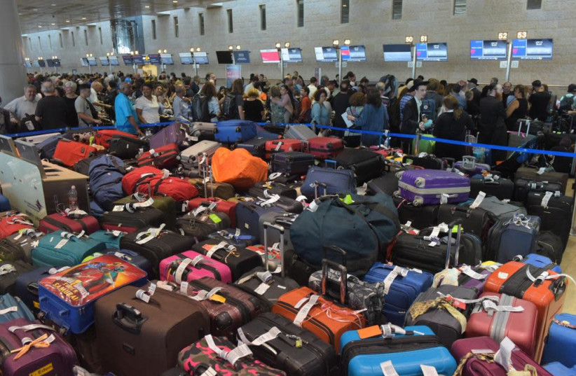Ben-Gurion Airport baggage malfunction causes travel disruption  (credit: AVSHALOM SASSONI/ MAARIV)