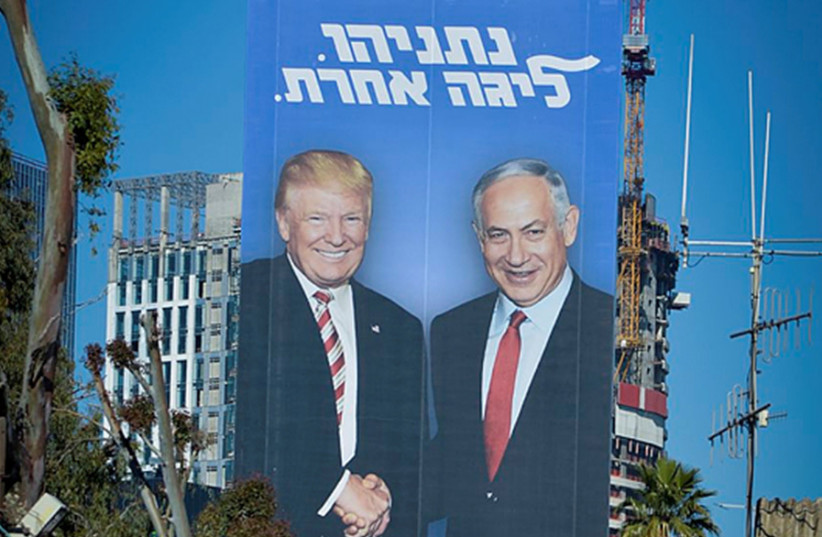 A Likud election poster shows Prime Minister Benjamin Netanyahu with US President Donald Trump under the slogan, ‘Netanyahu. In a league of his own’ (photo credit: STEVE LINDE)